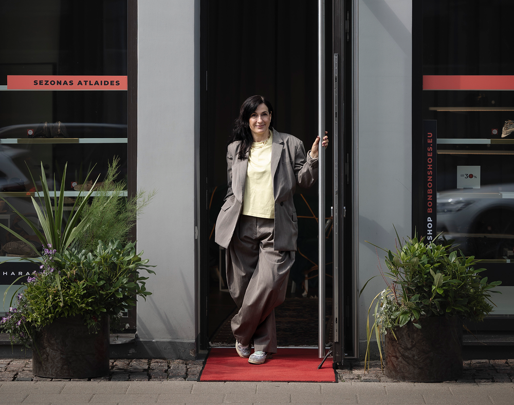 Jana Lindberga, founder of Bonbon Shoes, at the boutique entrance in Rīga